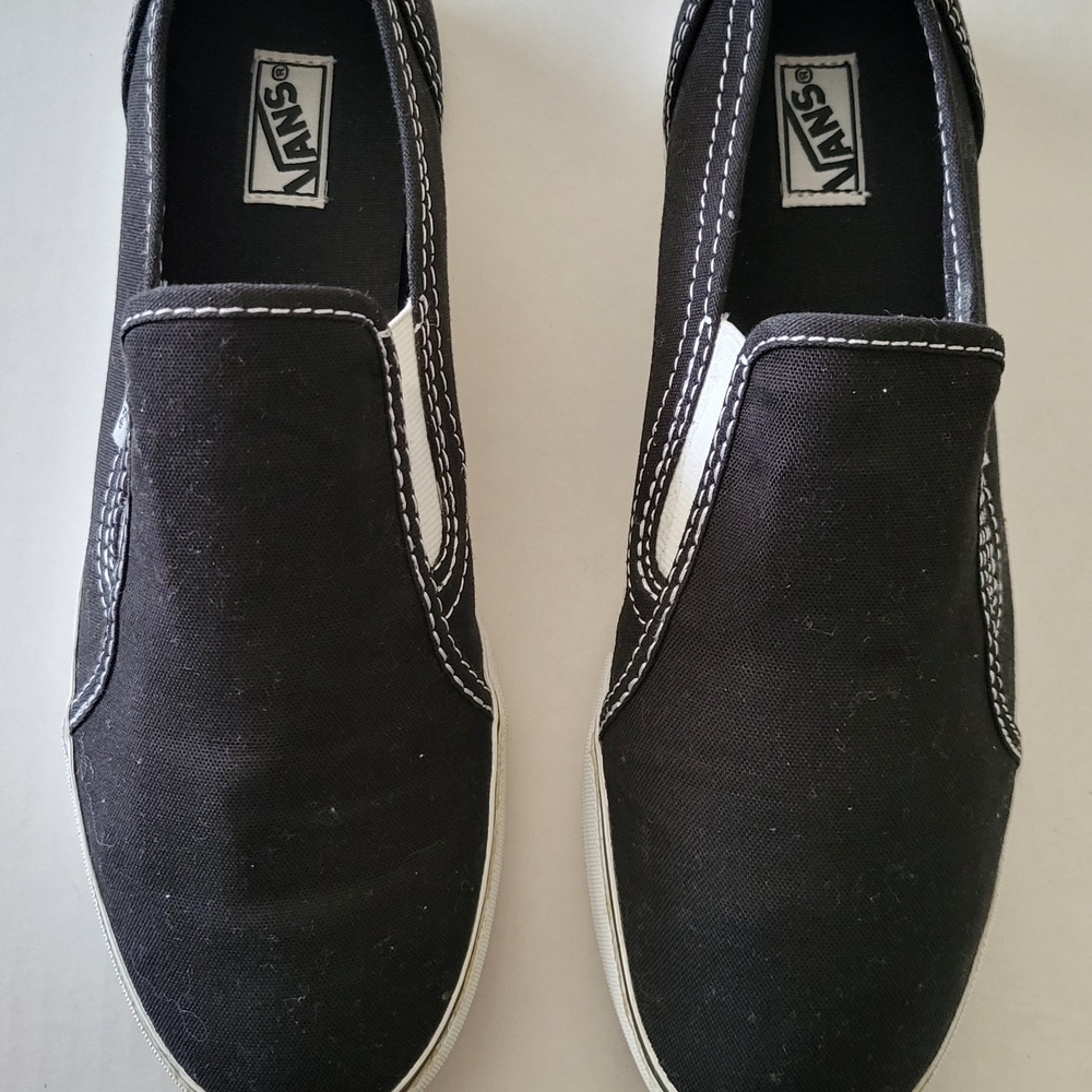 Vans Black and White Slip-On Sneakers